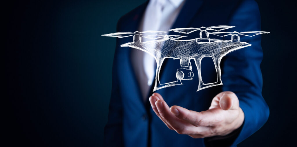 Businessman hold futuristic drone in hands